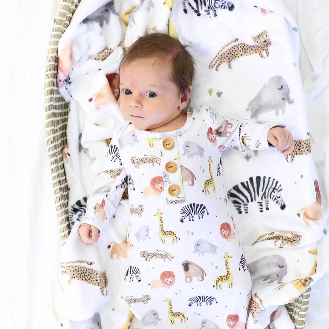 white knot gown with safari animals for newborns