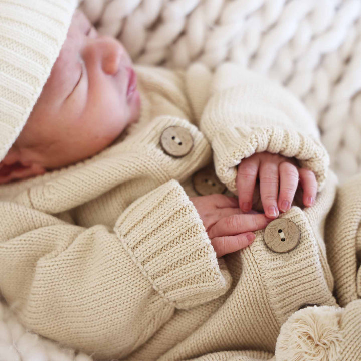 sand long sleeve knit sweater romper with buttons