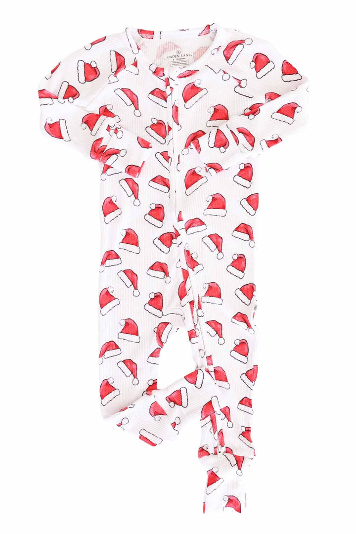 Caden Lane white waffle-knit zip romper with a festive red Santa hat print