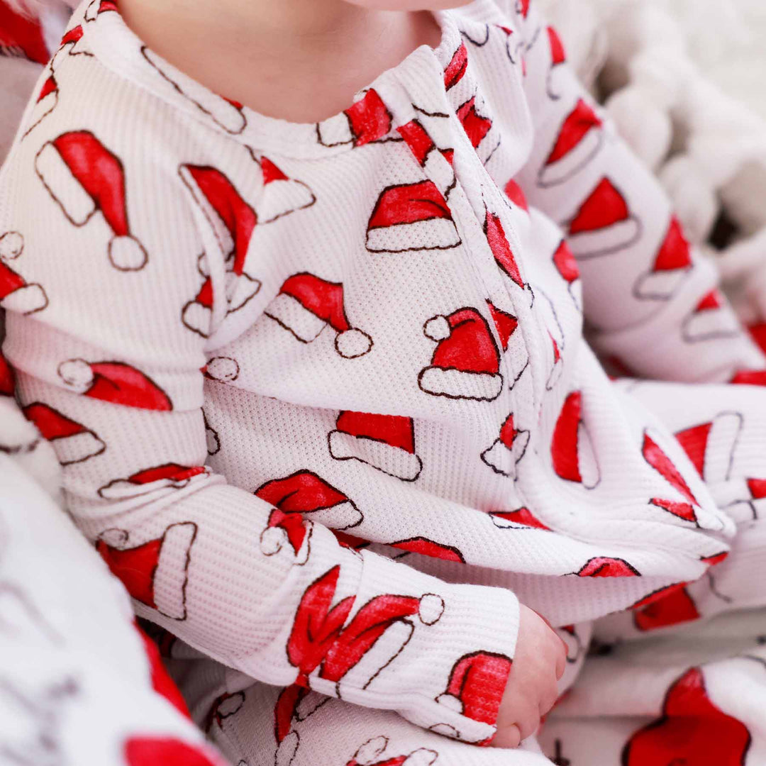 baby and toddler christmas sleep romper with santa hats 