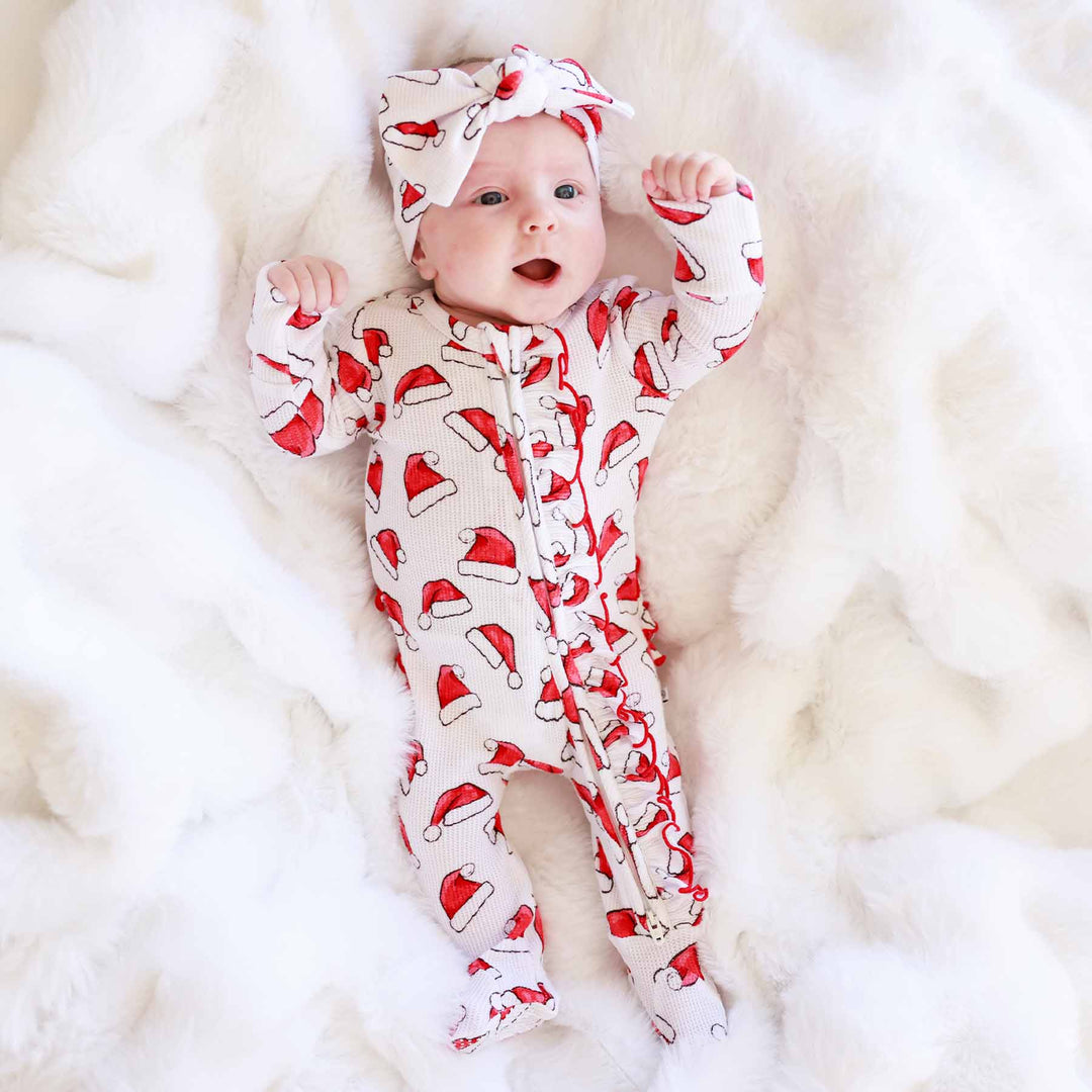 santa baby ruffle zipper footie for baby girls with santa hats 