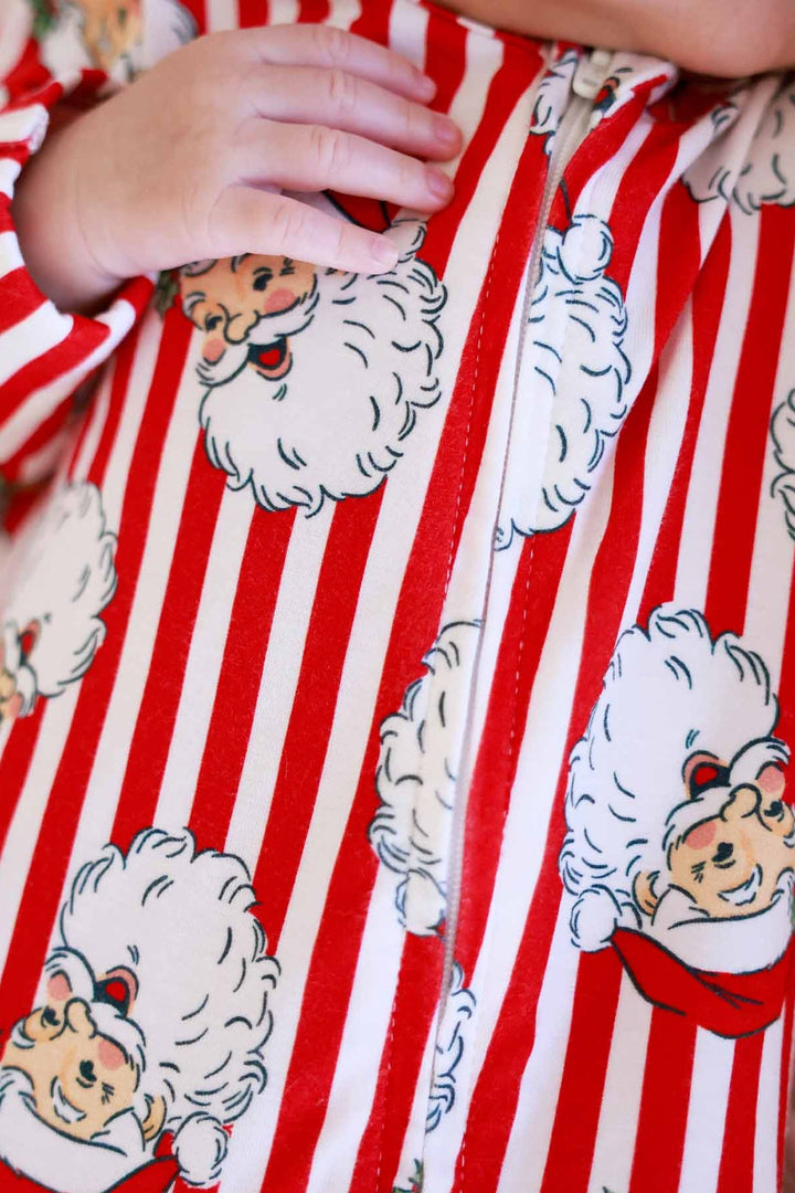 Baby with Caden Lane stripped santa claus lane footie