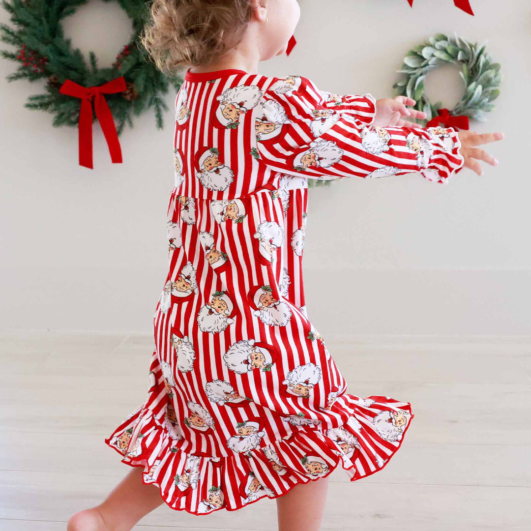 Little girl wearing the Santa Claus Lane Long Sleeve Nightgown