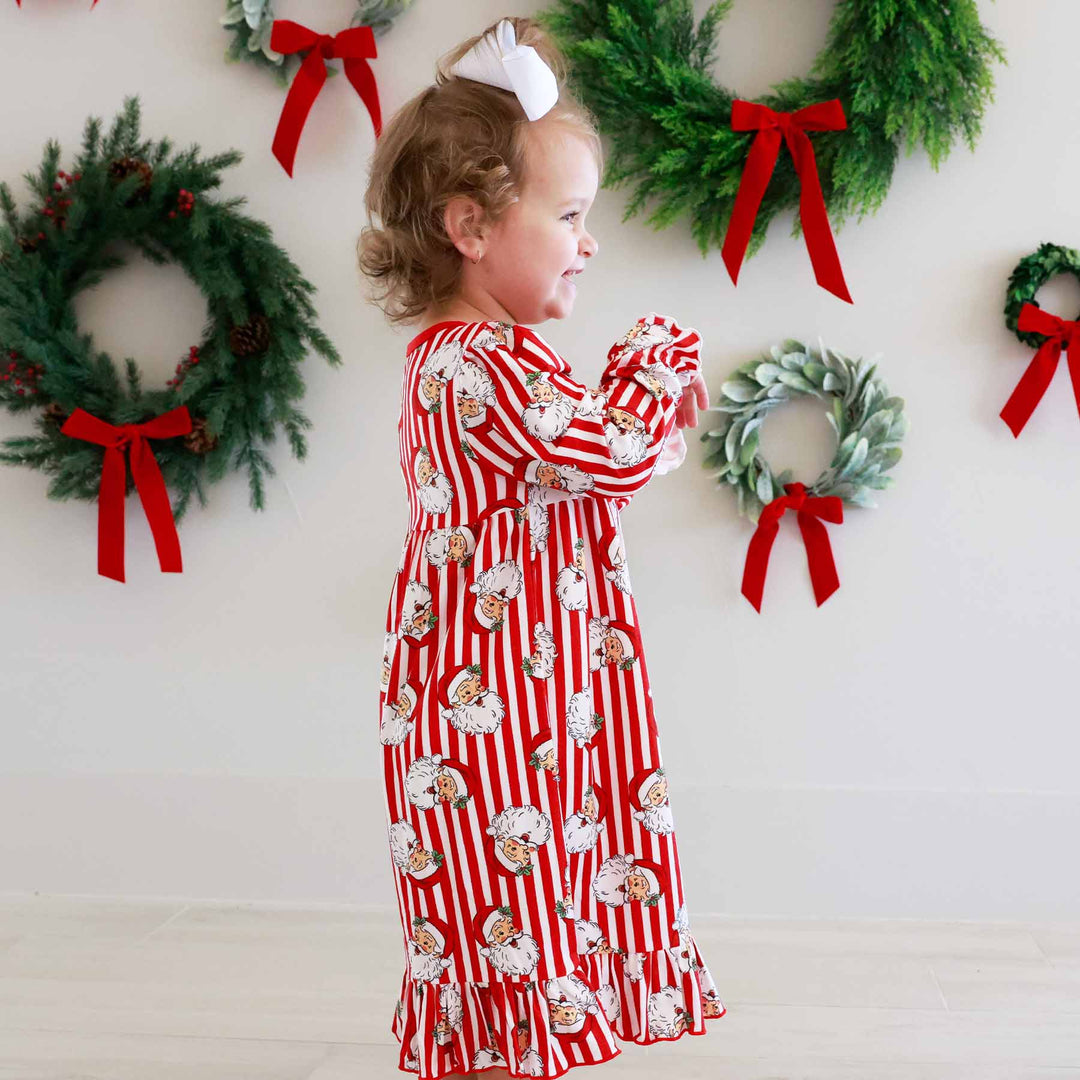 Little girl wearing the Santa Claus Lane Long Sleeve Nightgown
