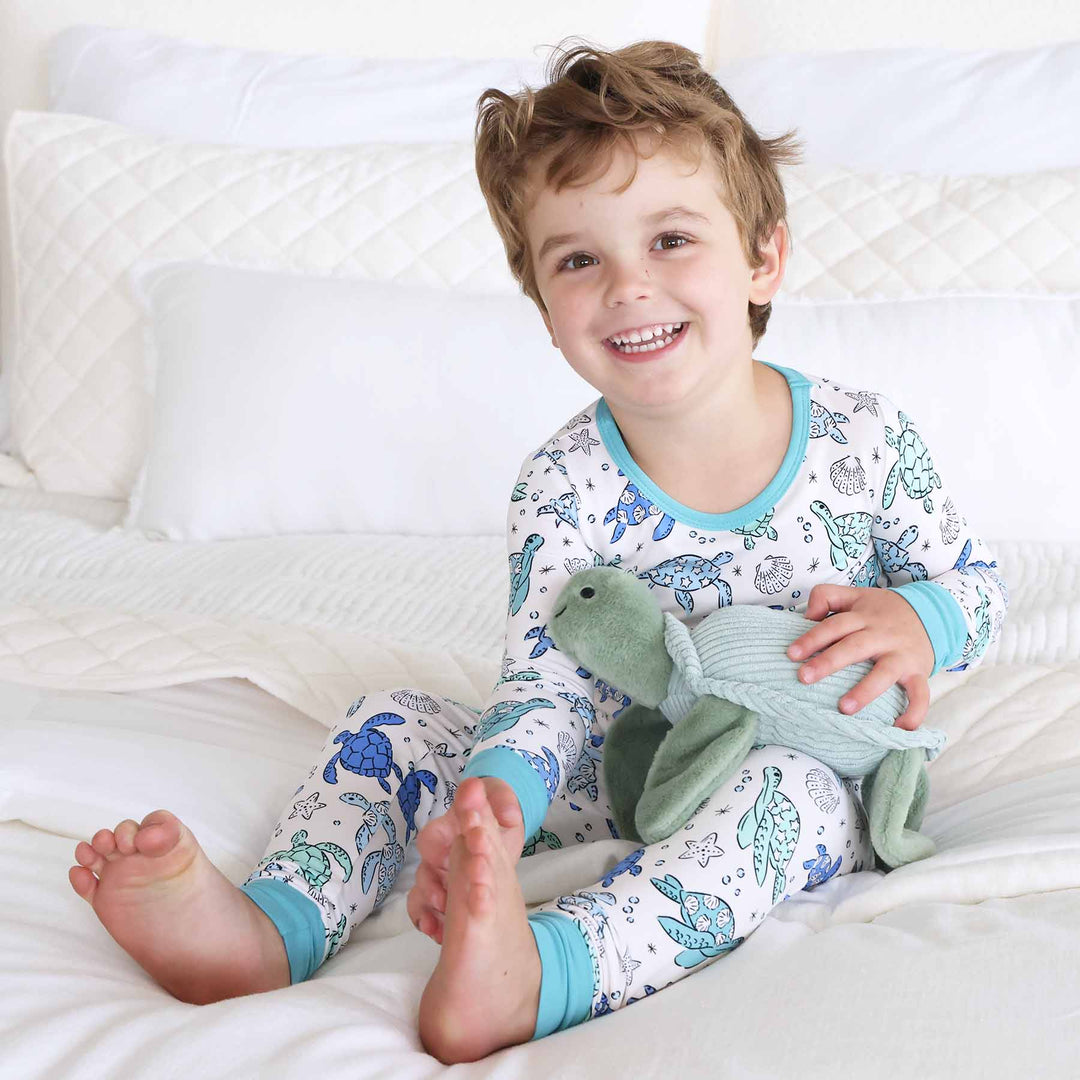 blue and green sea turtle with stars two piece pajama set for kids 