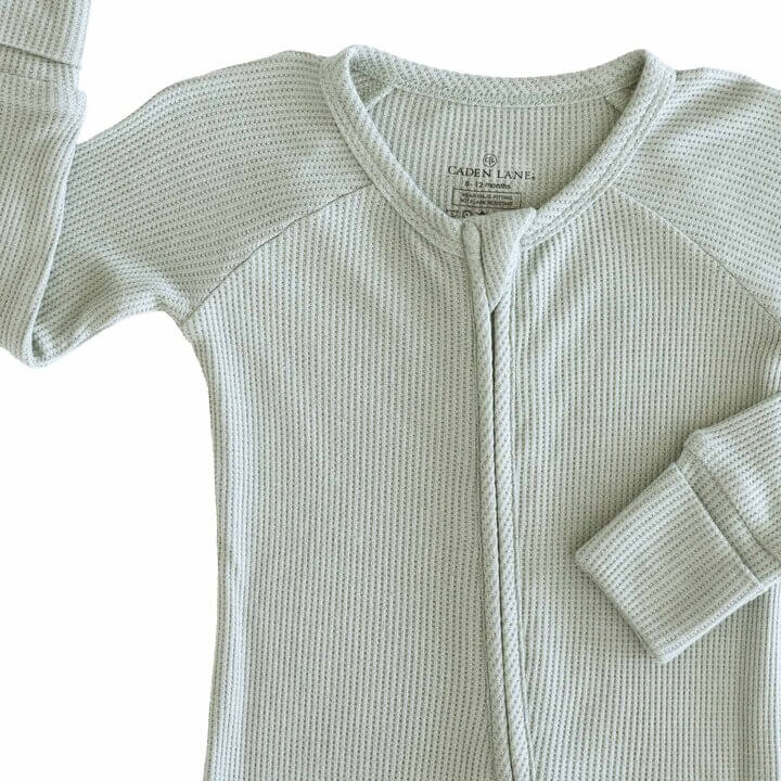 baby zip romper light green