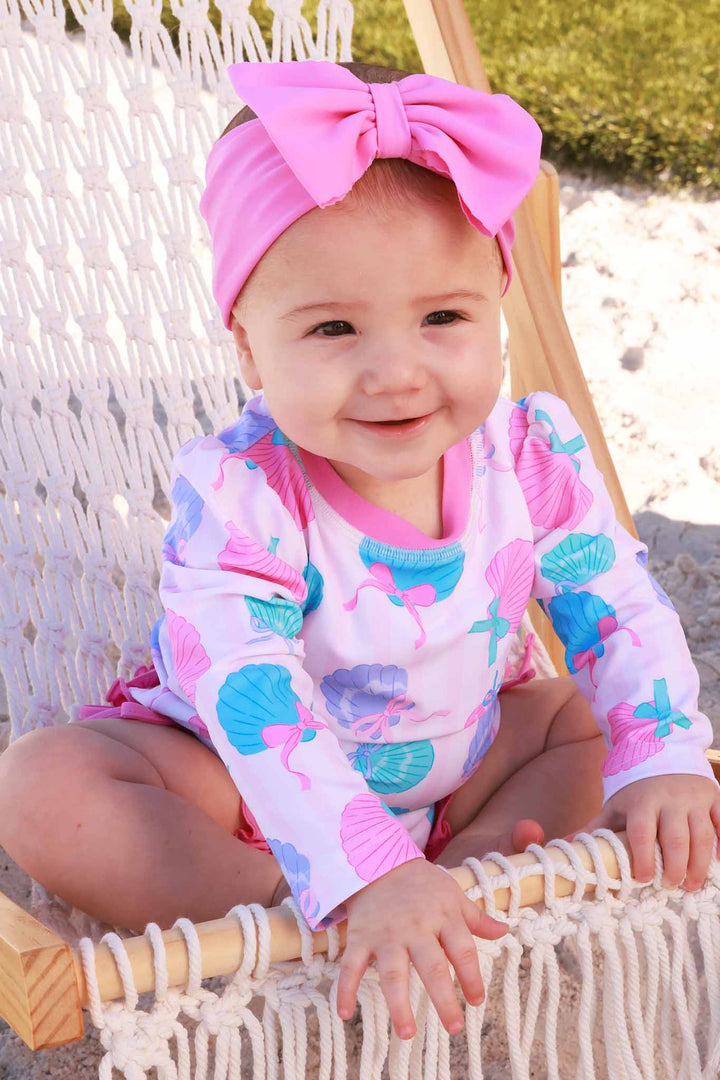 seaside sweetie seashell ruffle bottom rash guard swimsuit with matching pink headwrap