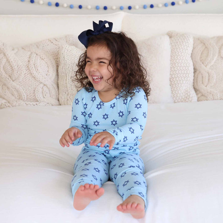 kids two piece pajama set for hanukkah with stars of david and ribbed cuffs 