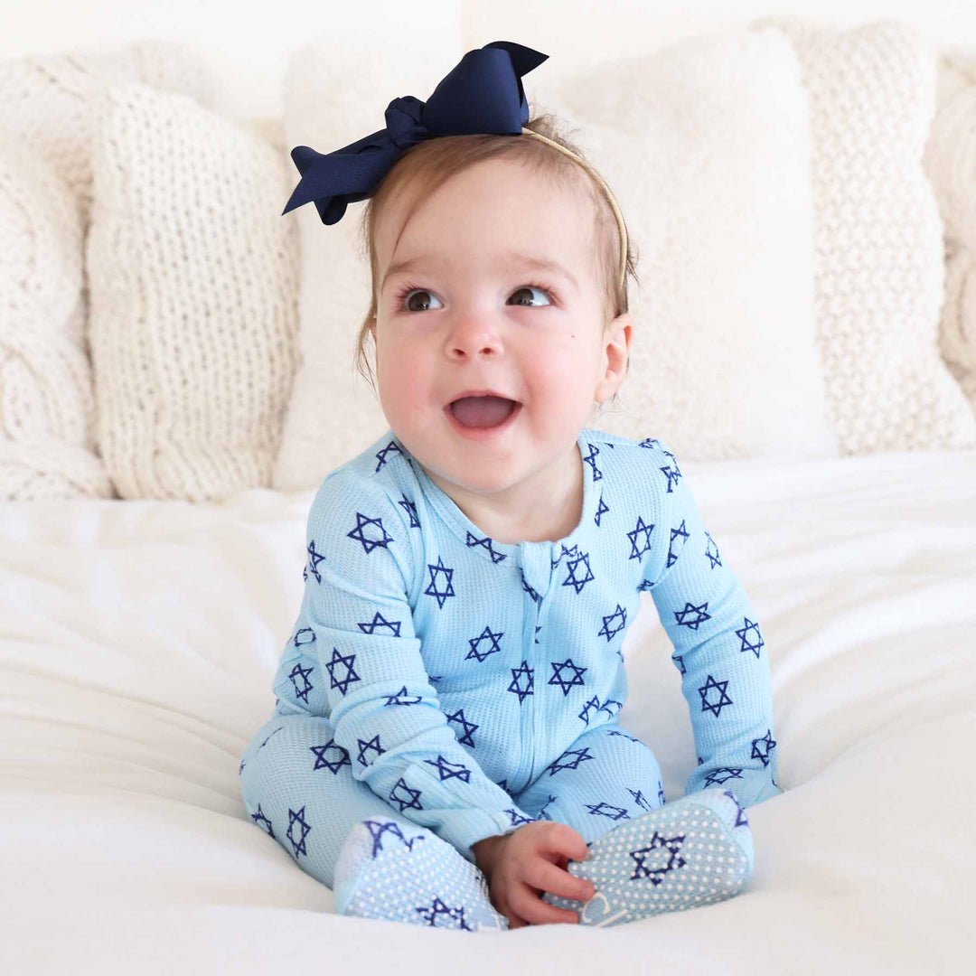 gender neutral hanukkah footie for babies light blue with navy blue stars of david