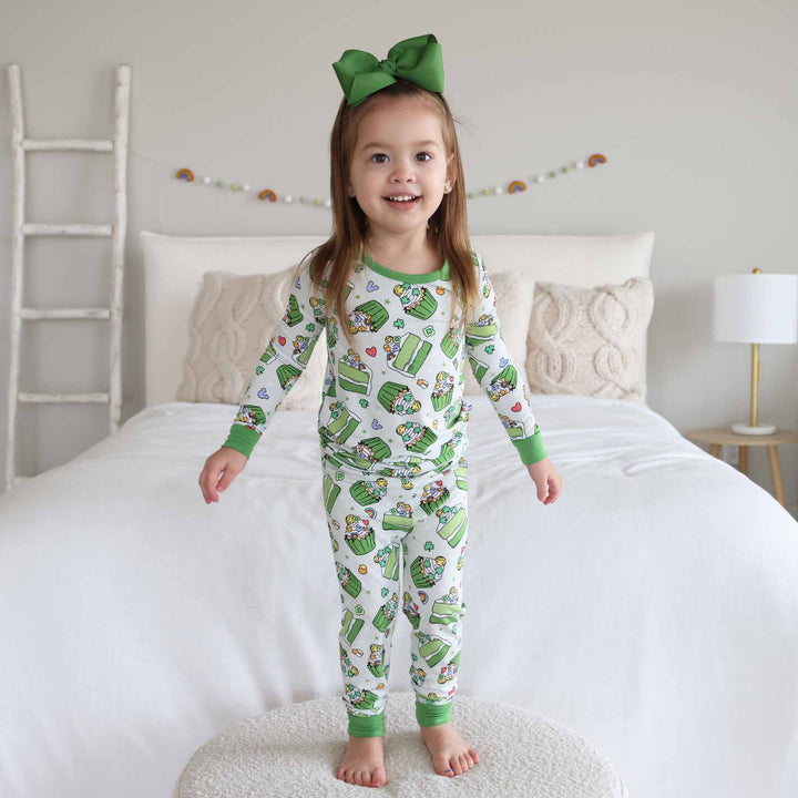 shamrock sweets two piece pajama set with matching green clip bow for girls 