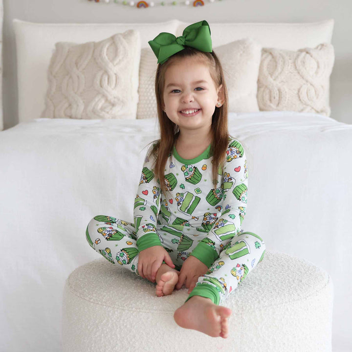shamrock sweets two piece pajama set for girls with green clip on ribbon bow