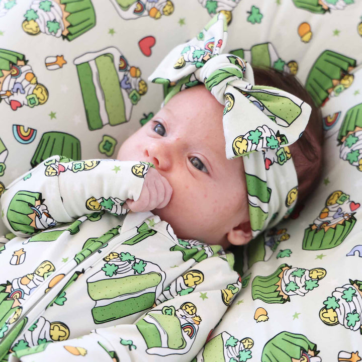 closeup of shamrock sweets knit large bow headwrap for girls 