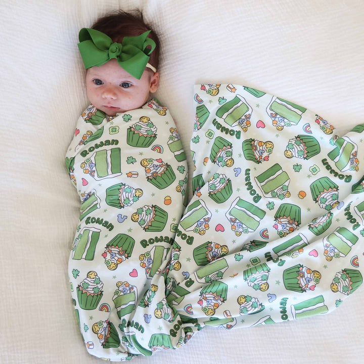 green cake, cupcake, rainbow and clover personalized swaddle blanket for babies 