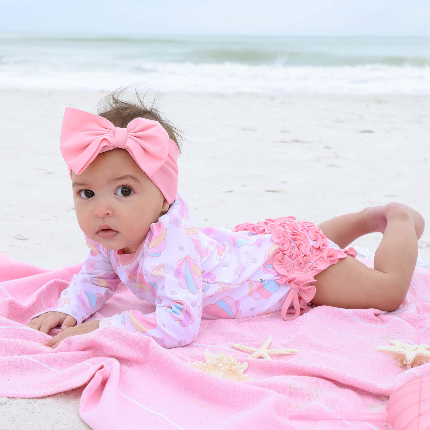 shell pink swim bow for babies