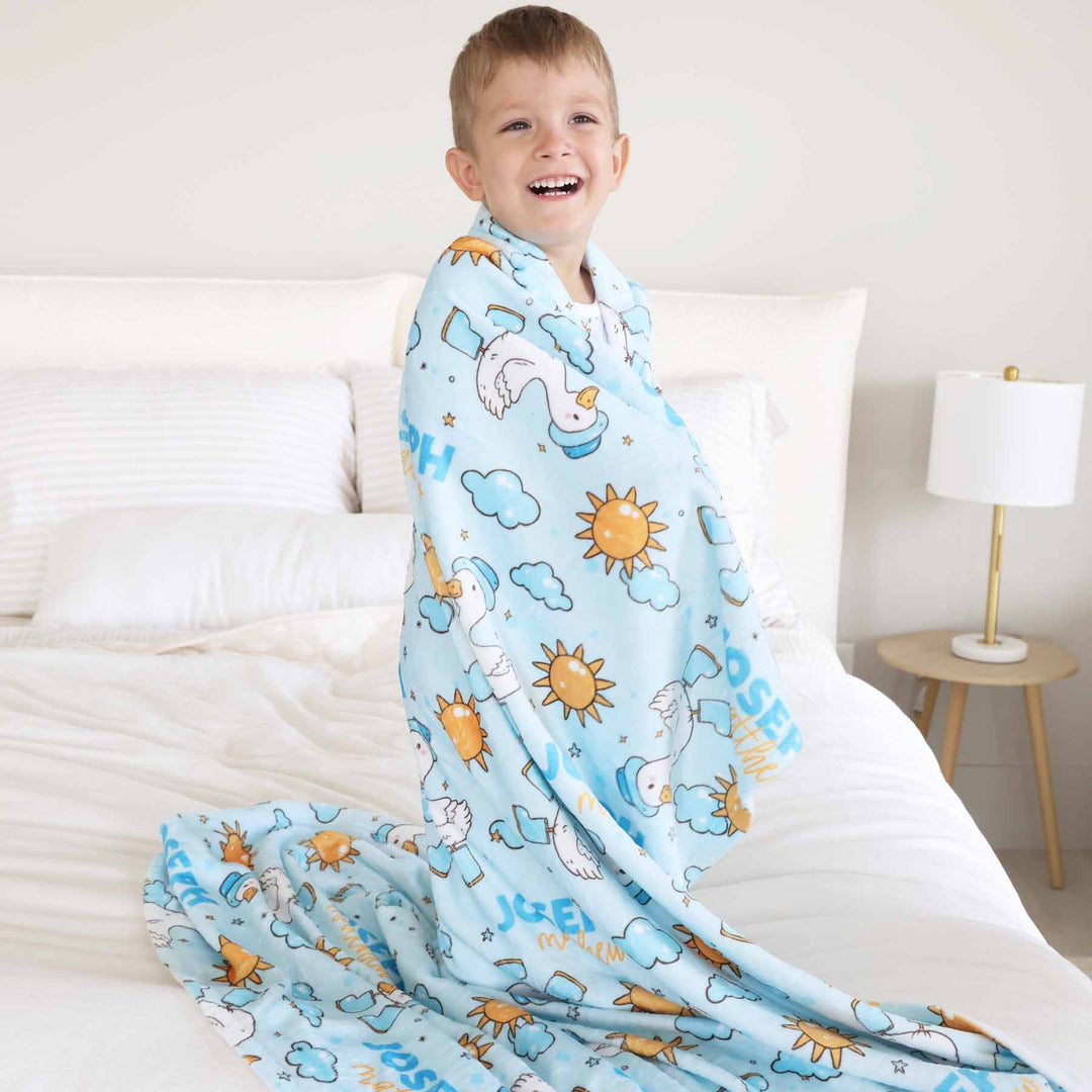 kids personalized goose blanket with suns and clouds