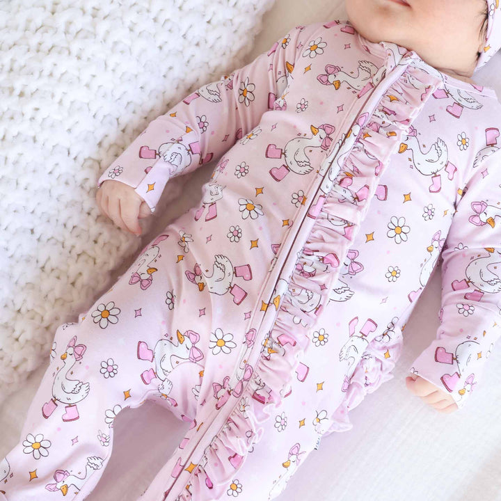 pink goose ruffle zipper footie for girls 