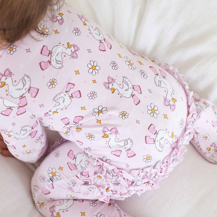 back of pink silly goose ruffle footie