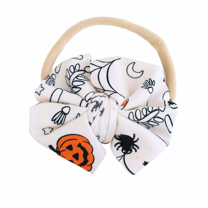 silly skellies glow in the dark knit bow headband 