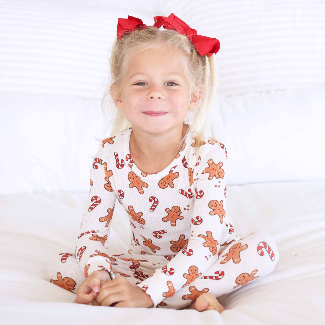 gender neutral christmas pajamas for kids with gingerbread men and candy canes 