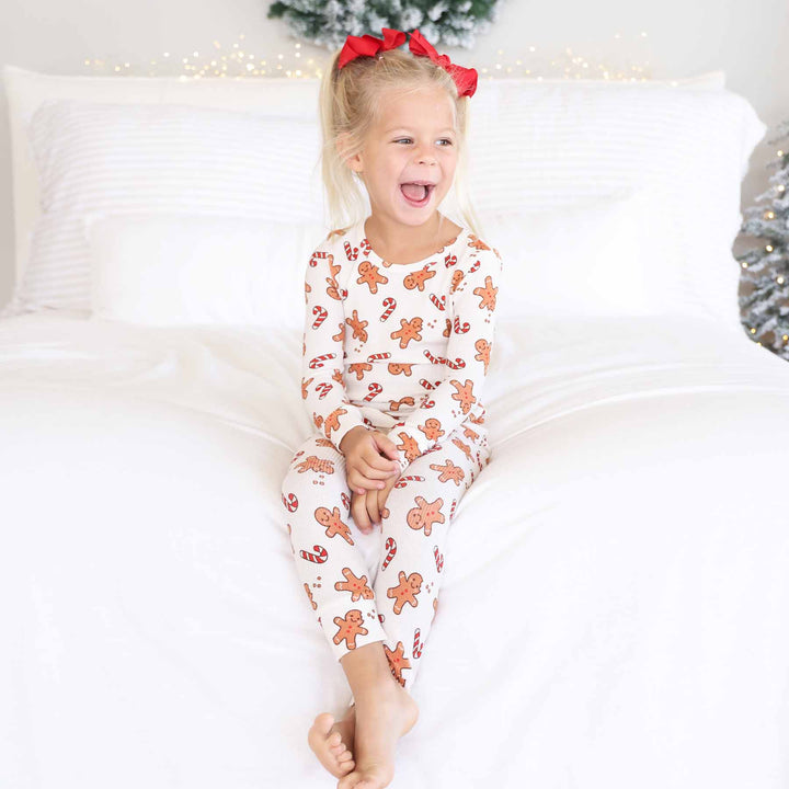 caden lane bamboo waffle two piece pajama set for kids with gingerbread men and candy canes 