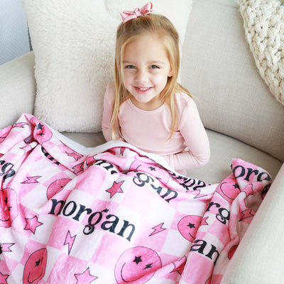 smiley face pink checkered blanket for kids 