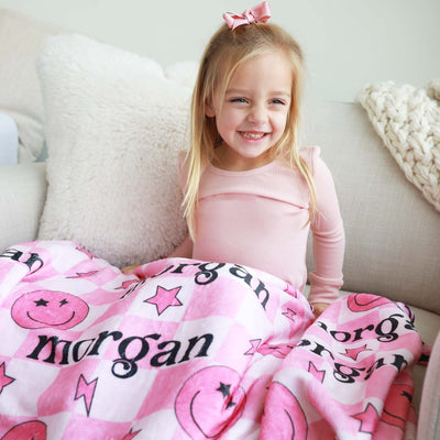 smiley checkered blanket for kids pink 