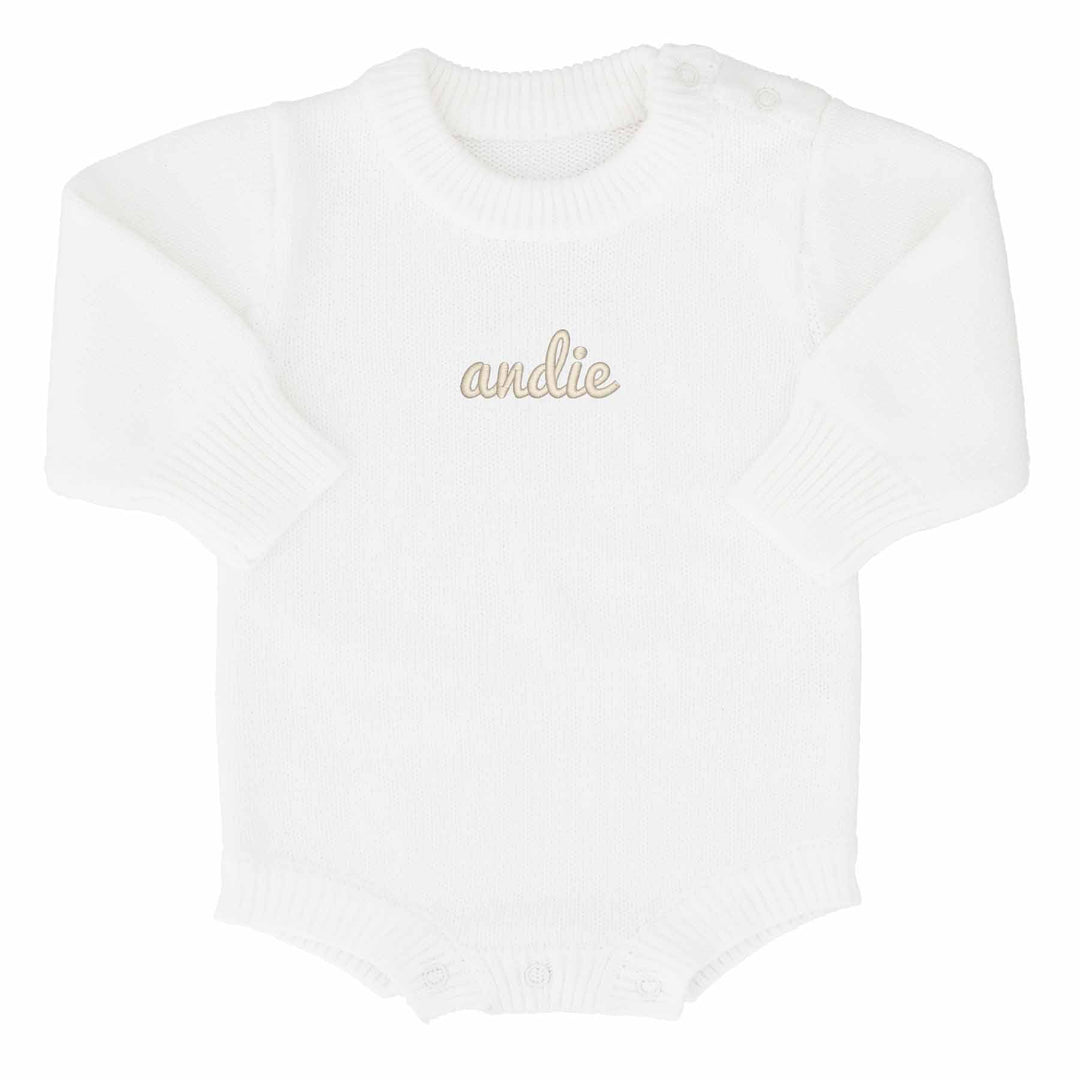 white embroidered knit bubble romper with script font 