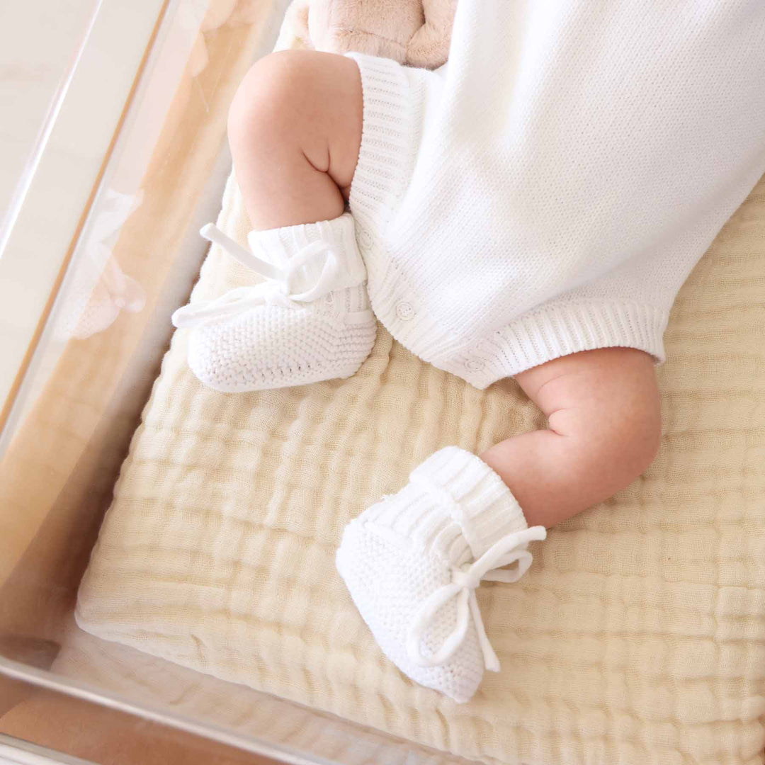 white knit baby booties gender neutral