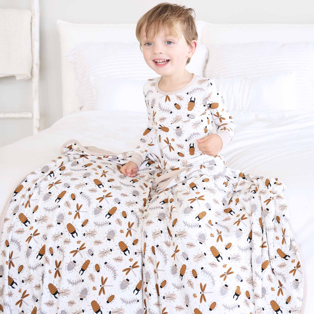 white, brown and taupe bug double sided bamboo blanket for kids gender neutral