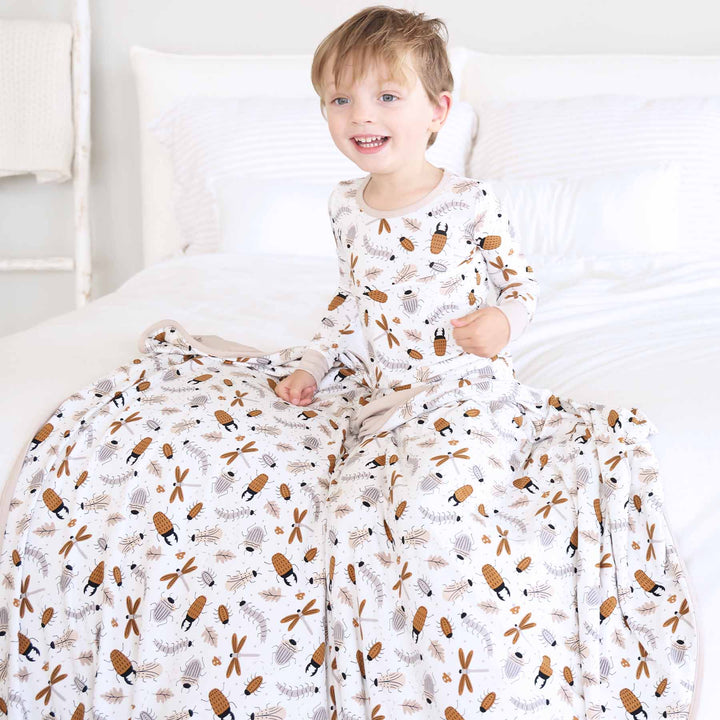 white, brown and taupe bug double sided bamboo blanket for kids gender neutral