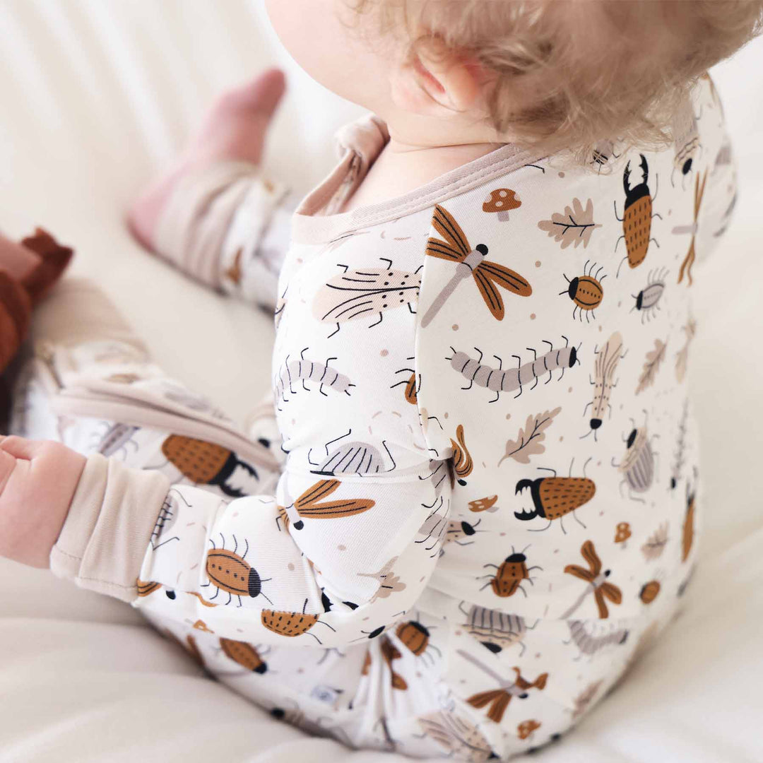 neutral bug zip romper for babies 