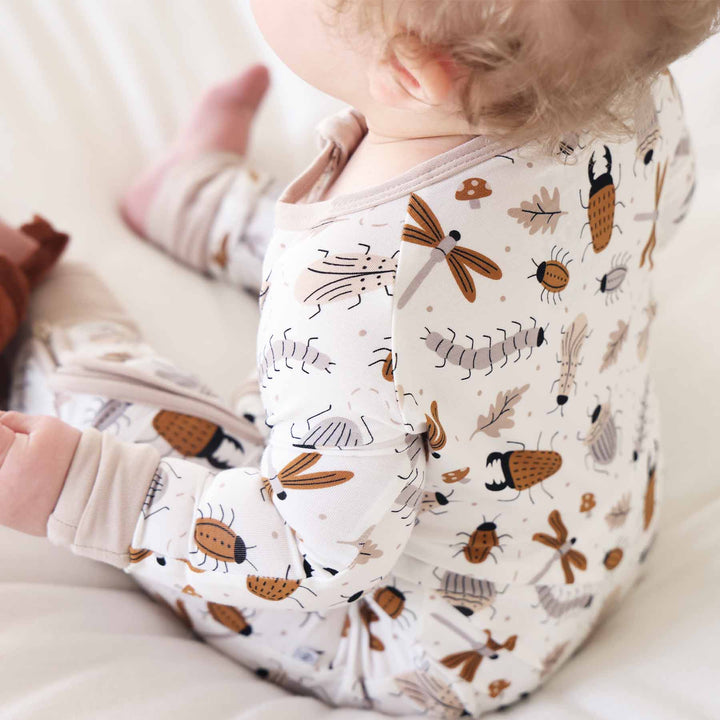 neutral bug zip romper for babies 
