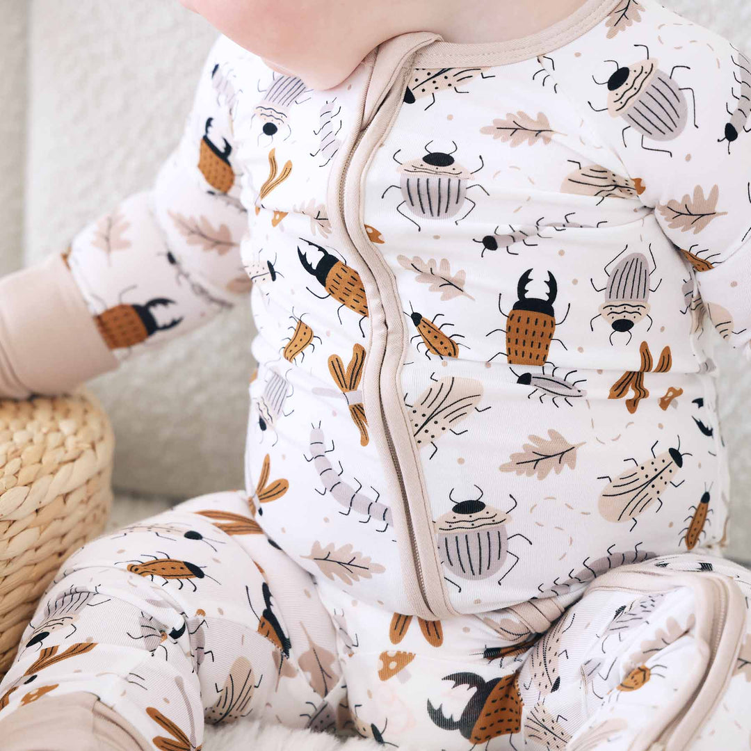 neutral bug zip romper for toddlers 