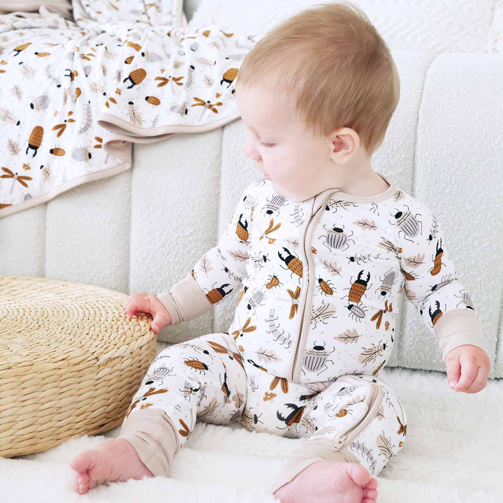 snuggle bug neutral zip romper for babies and toddlers 