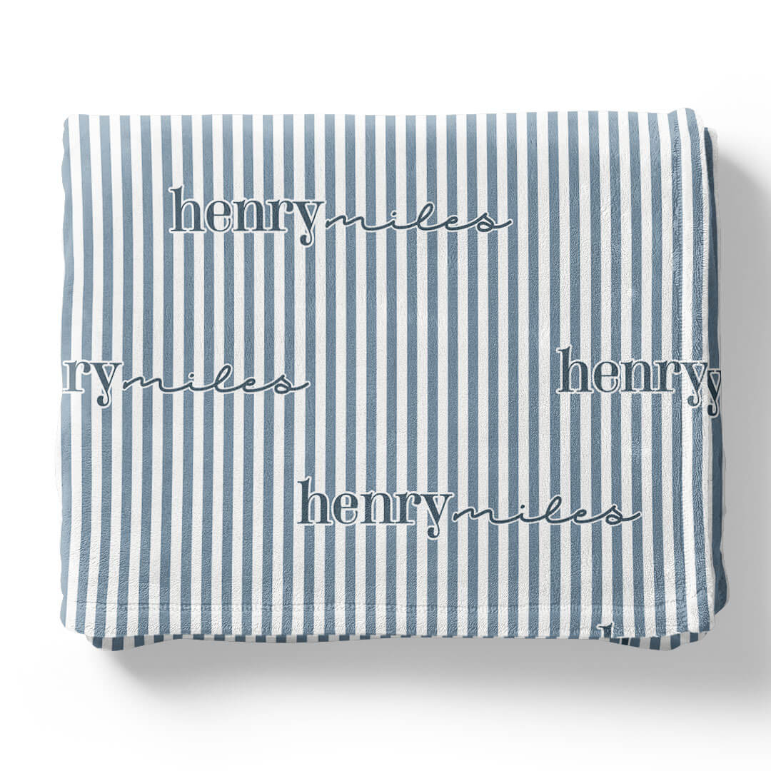 dusty blue and white stripe personalized blanket for kids in lowercase font 