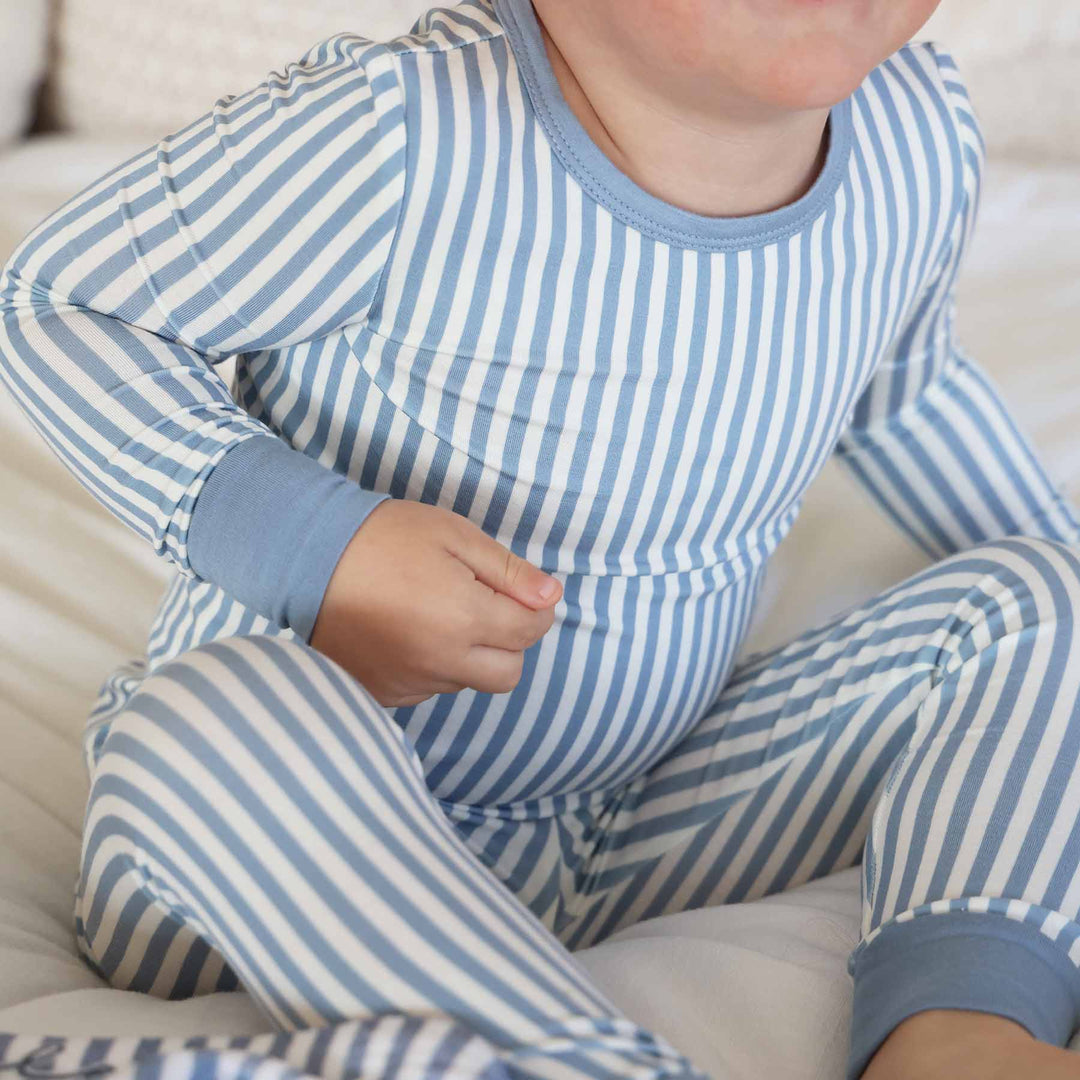 close up of dusty blue and white stripe long sleeve bamboo viscose two piece pajama set 