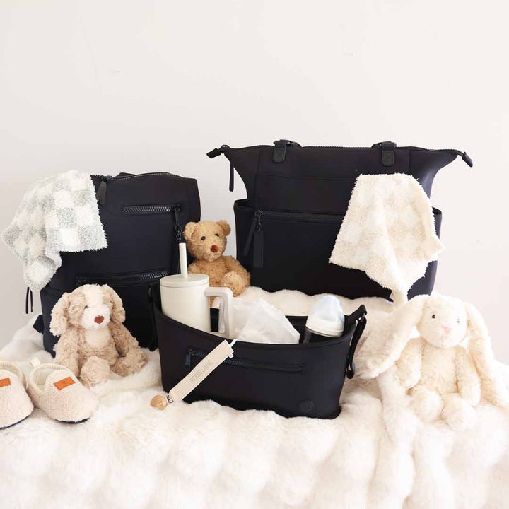 black stroller caddy and diaper bags