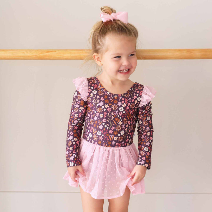 sugar plum girls leotard with long sleeves and ruffle shoulders