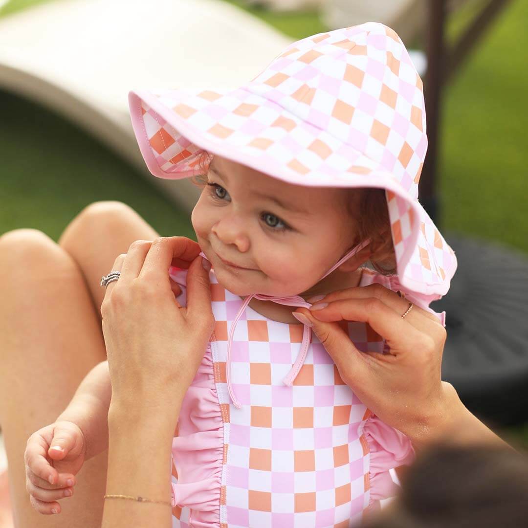 pink and orange checkered sun hat 