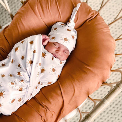 swaddle blanket for newborns oversized with orange suns 