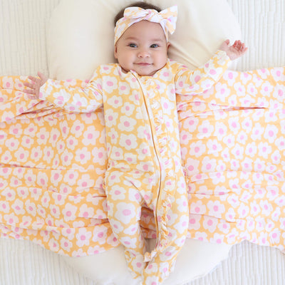 zipper footie for babies yellow and pink daisies