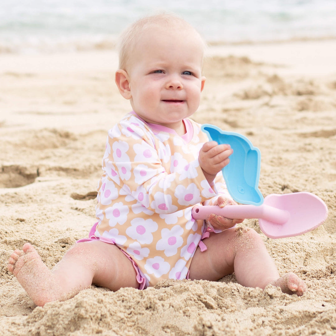 pink and yellow daisy swim ruffle butt rash guard 