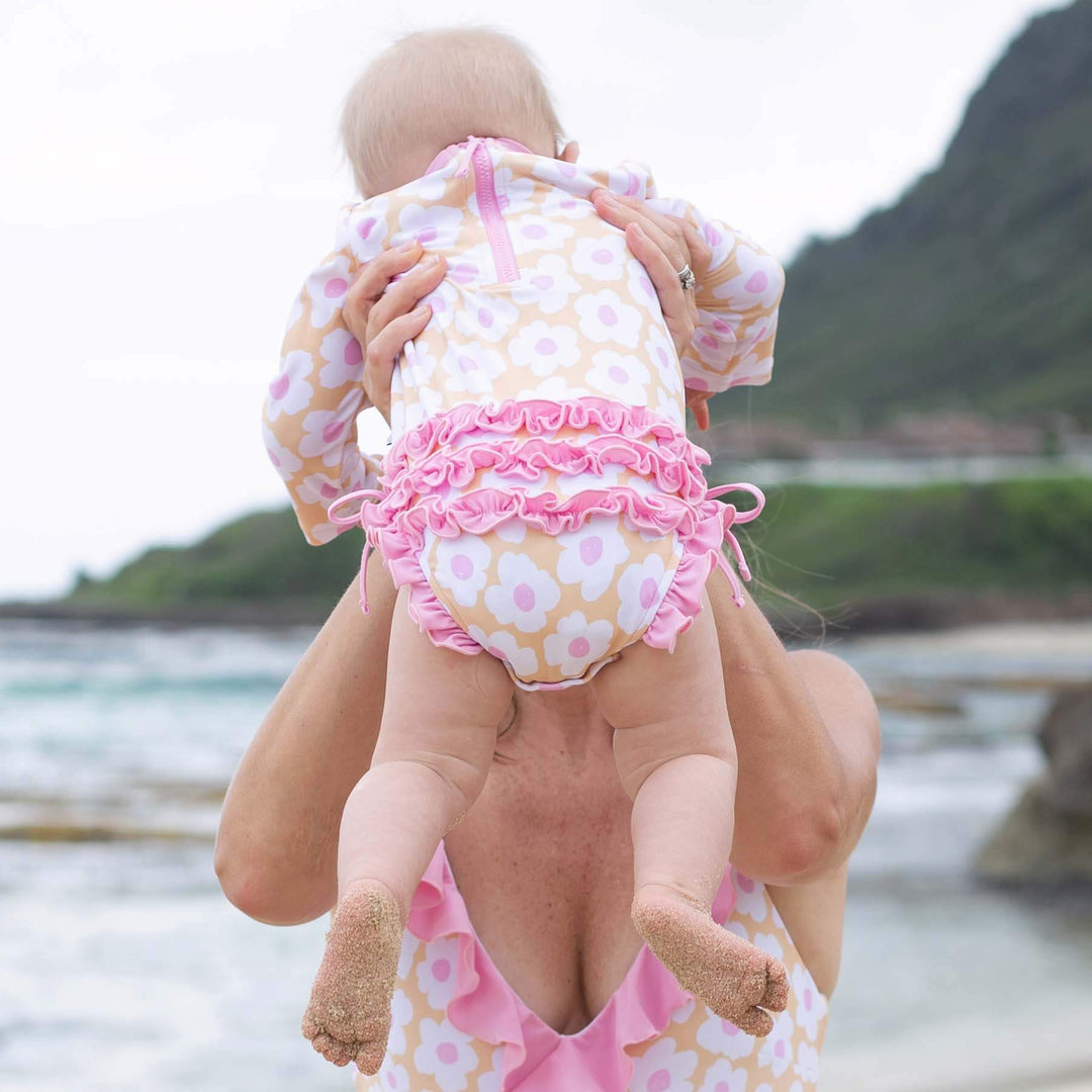 ruffle butt rash guard for girls pink and yellow daisy 