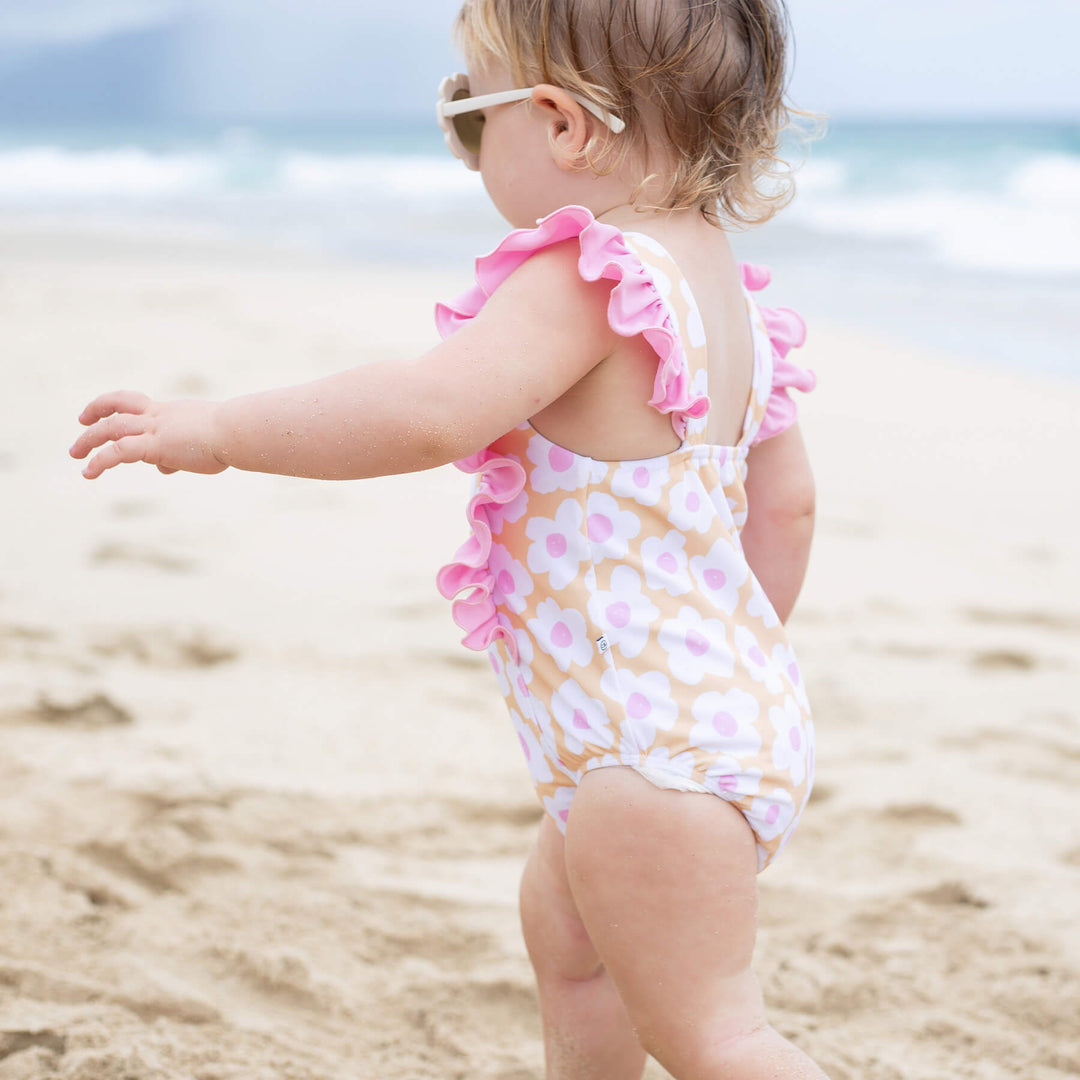 ruffle one piece swimsuit pink and yellow daisies 