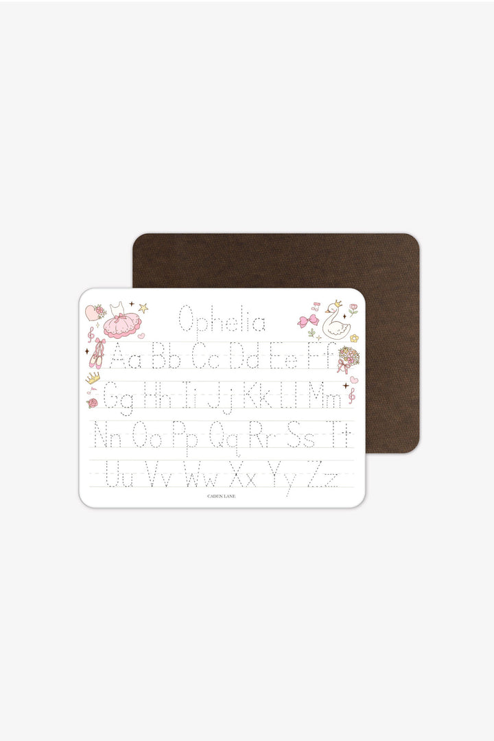Front and back view of a personalized Caden Lane Swan Ballet alphabet whiteboard with dark wood-grain back, showing ballet dress, swan, and tracing letters with custom name