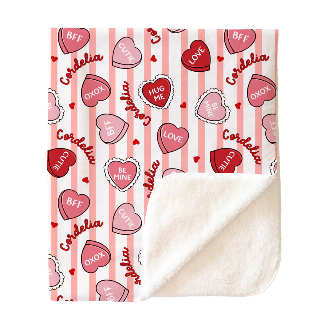 sherpa flat lay of sweet like candy personalized kids blanket in pink with matching two piece pajamas