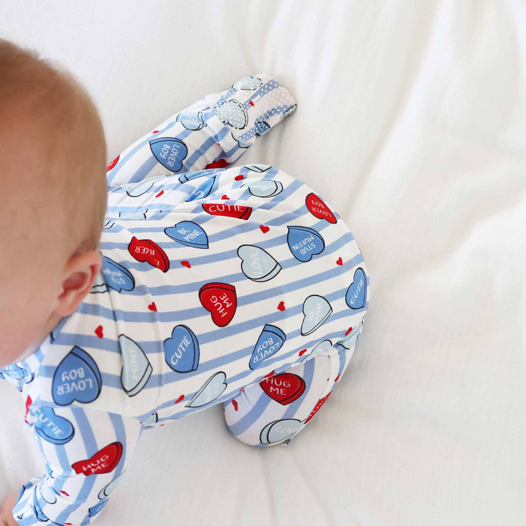 blue and red candy heart valentine's day footie pajama for baby boys made of bamboo