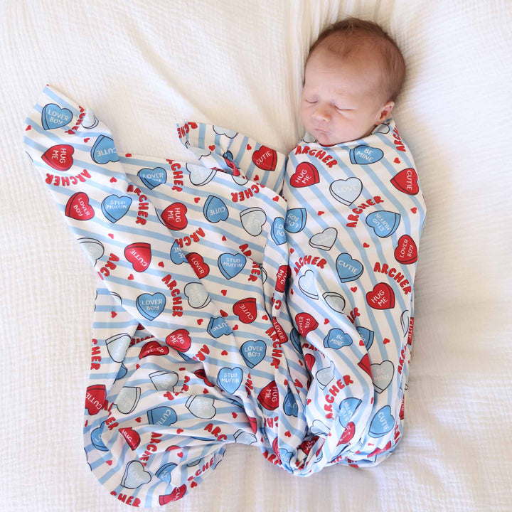 newborn boy personalized valentine's day swaddle blanket with stripes and candy hearts