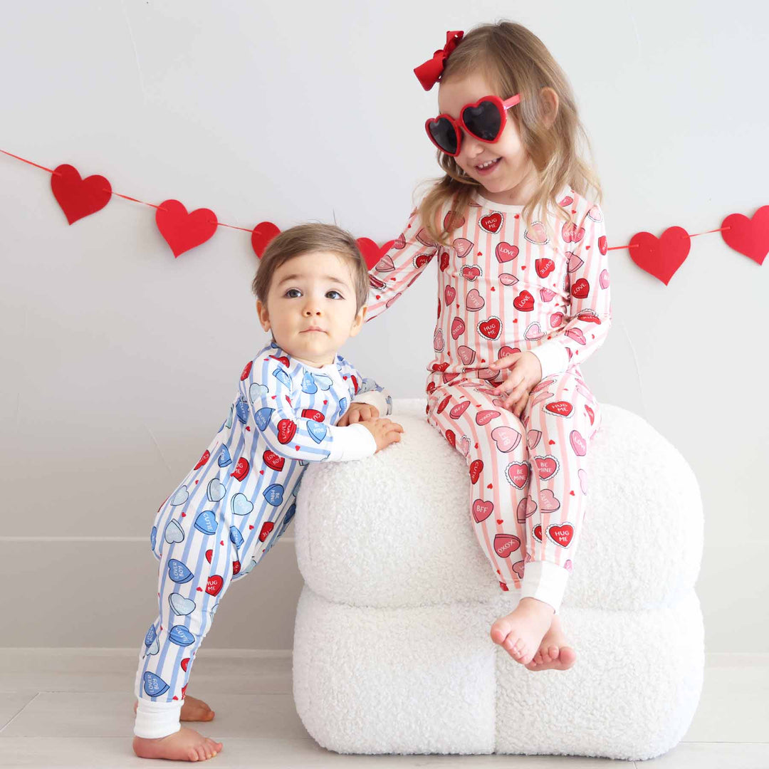 valentine's day sibling matching pajamas in blue and pink 
