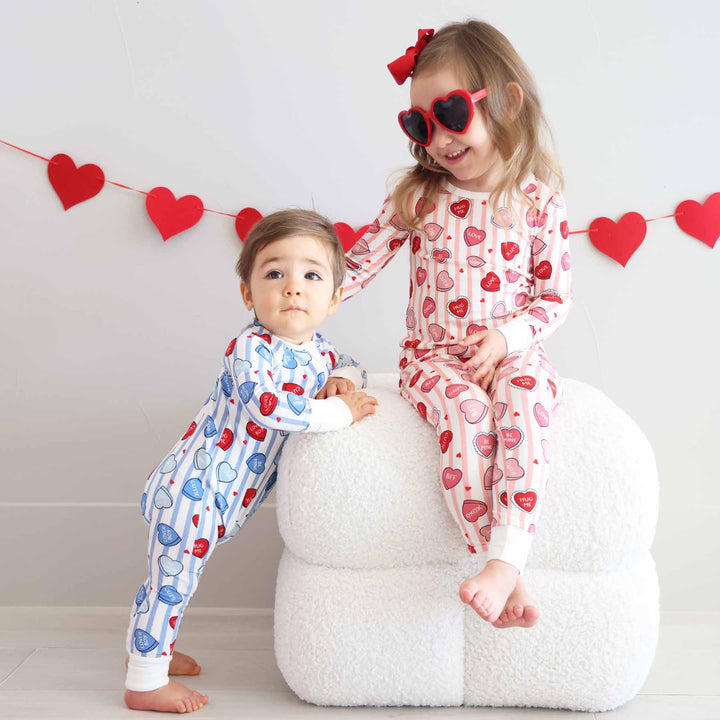 valentine's day sibling matching pajamas in blue and pink 